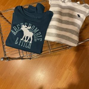 Two girls Abercrombie and Fitch tops, one is 11/12 and 13/14..